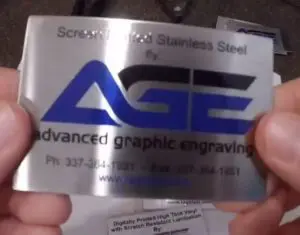 Stainless steel tag displaying screen printing, highlighting durability and precision from acid and laser etching tests.